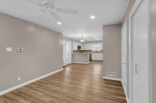 a view of kitchen with wooden floor