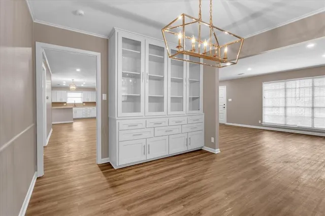 a view of a livingroom with wooden floor