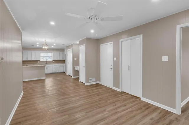 a view of kitchen with wooden floor