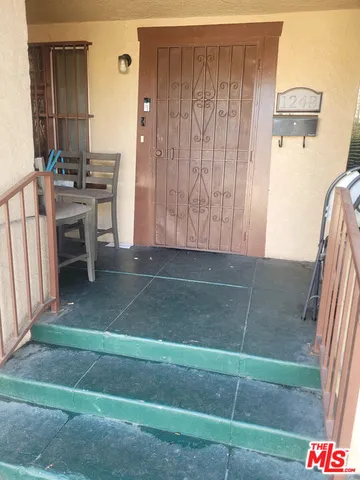 a view of a room with washer and dryer