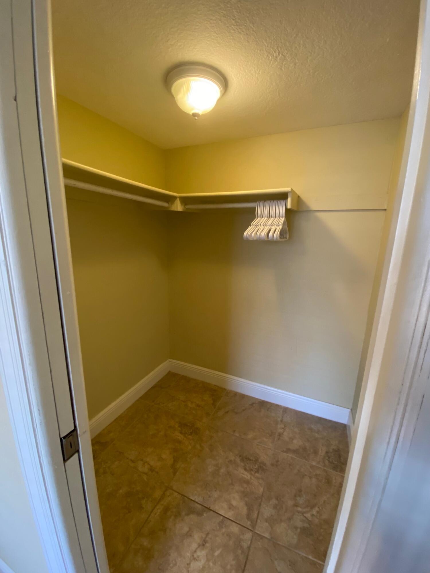 801 Hummingbird Way, Unit 104 North Palm Beach, FL 33408 - Photo 12 of 24 11) Master bedroom closet