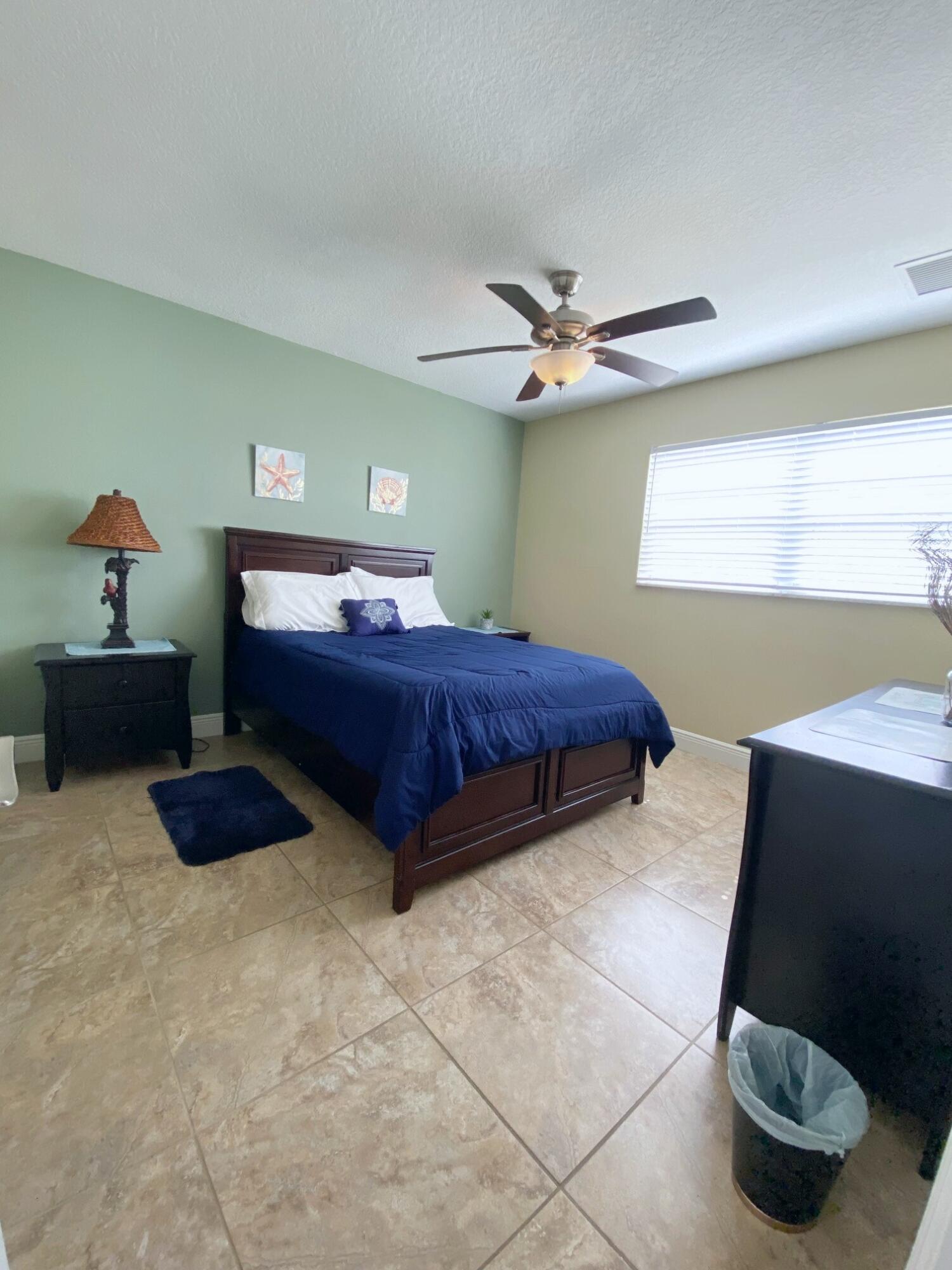 801 Hummingbird Way, Unit 104 North Palm Beach, FL 33408 - Photo 15 of 24 14) Guest Bedroom I