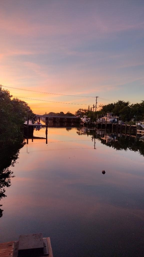 801 Hummingbird Way, Unit 104 North Palm Beach, FL 33408 - Photo 17 of 24 16 - Sunset dock (1)