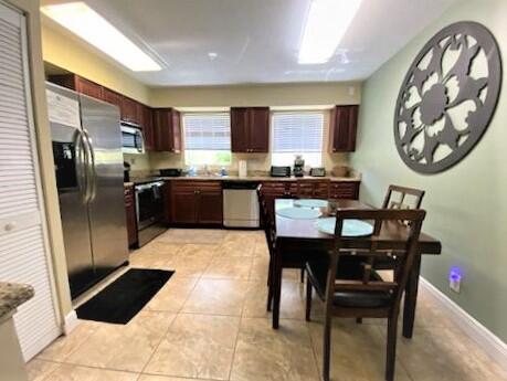 801 Hummingbird Way, Unit 104 North Palm Beach, FL 33408 - Photo 6 of 24 5) Kitchen II