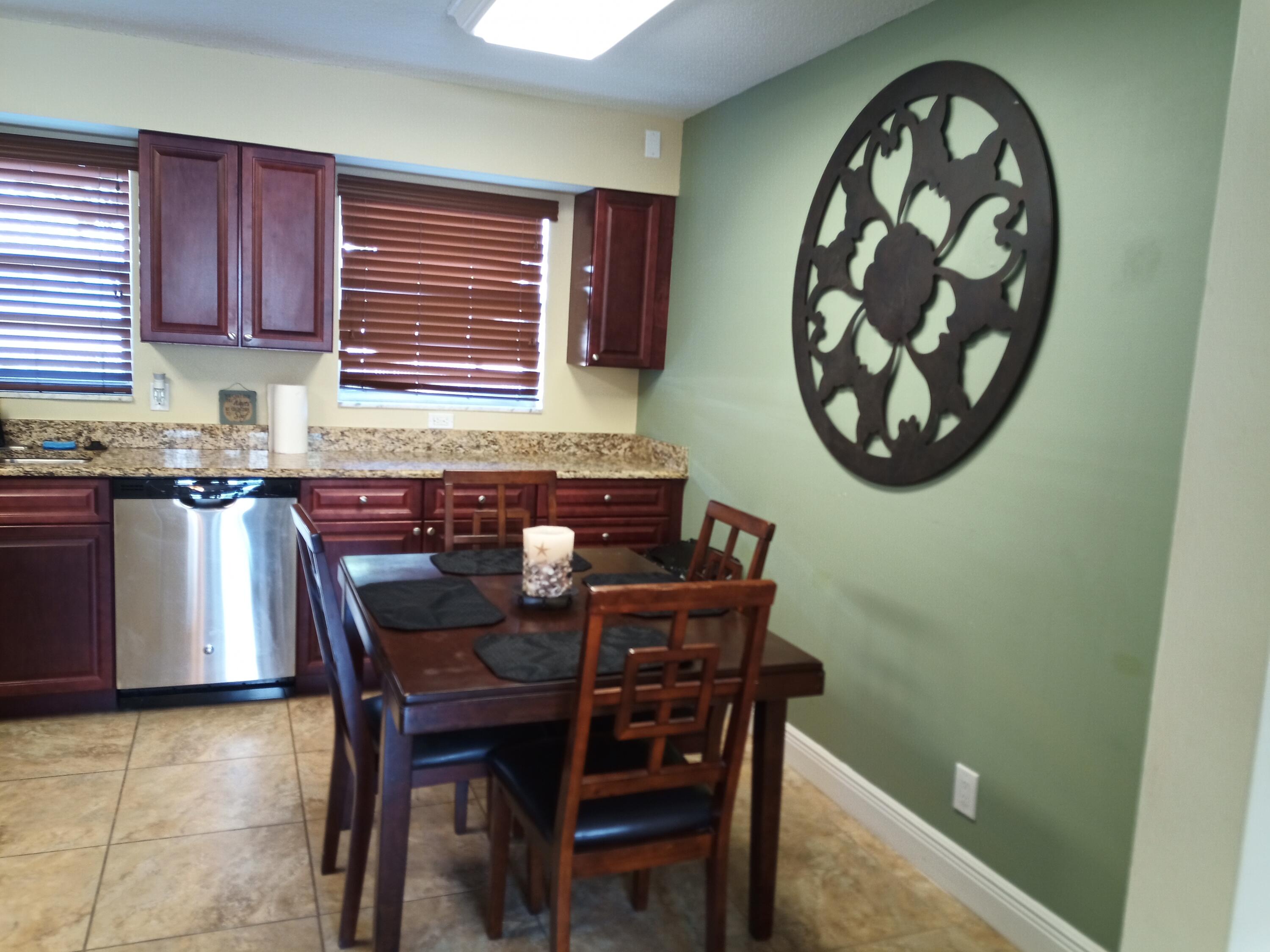 801 Hummingbird Way, Unit 104 North Palm Beach, FL 33408 - Photo 7 of 24 6) Kitchen III