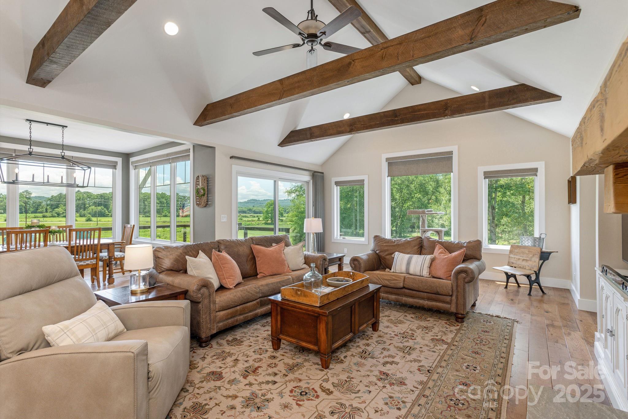 16 School House Road Mills River, NC 28759 - Photo 14 of 48 a living room with furniture and large windows