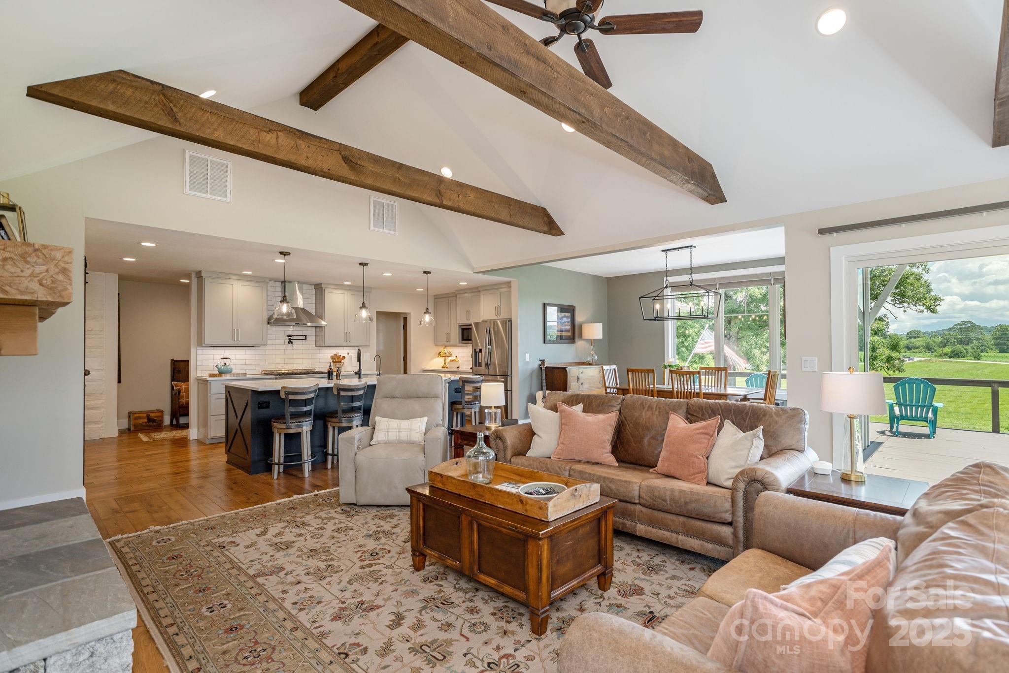 16 School House Road Mills River, NC 28759 - Photo 17 of 48 a living room with furniture and a large window