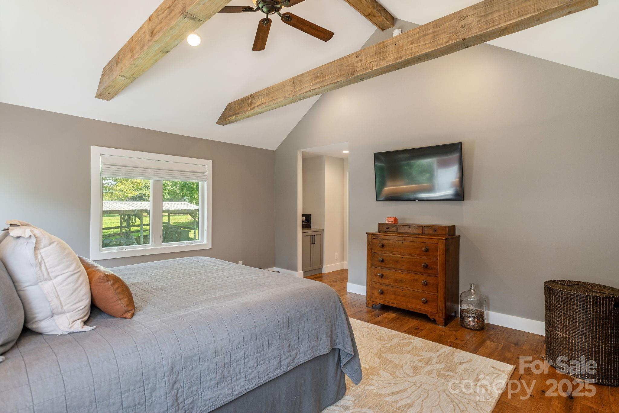 16 School House Road Mills River, NC 28759 - Photo 20 of 48 a bedroom with a bed and a flat screen tv