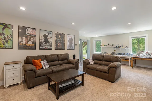 a living room with furniture and windows