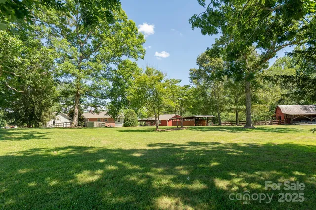 a view of a golf course with a big yard