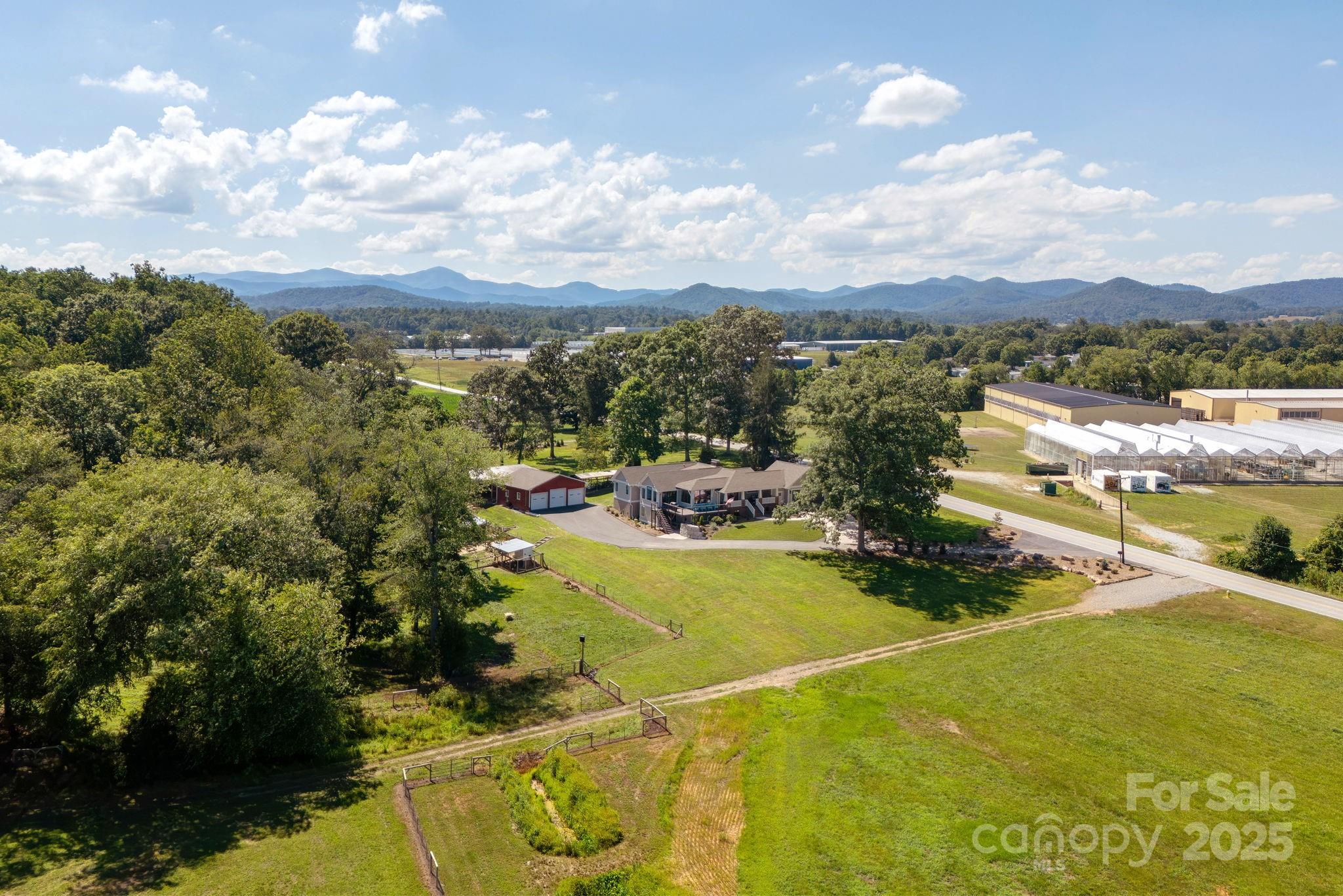 16 School House Road Mills River, NC 28759 - Photo 48 of 48 a view of a swimming pool and lake view