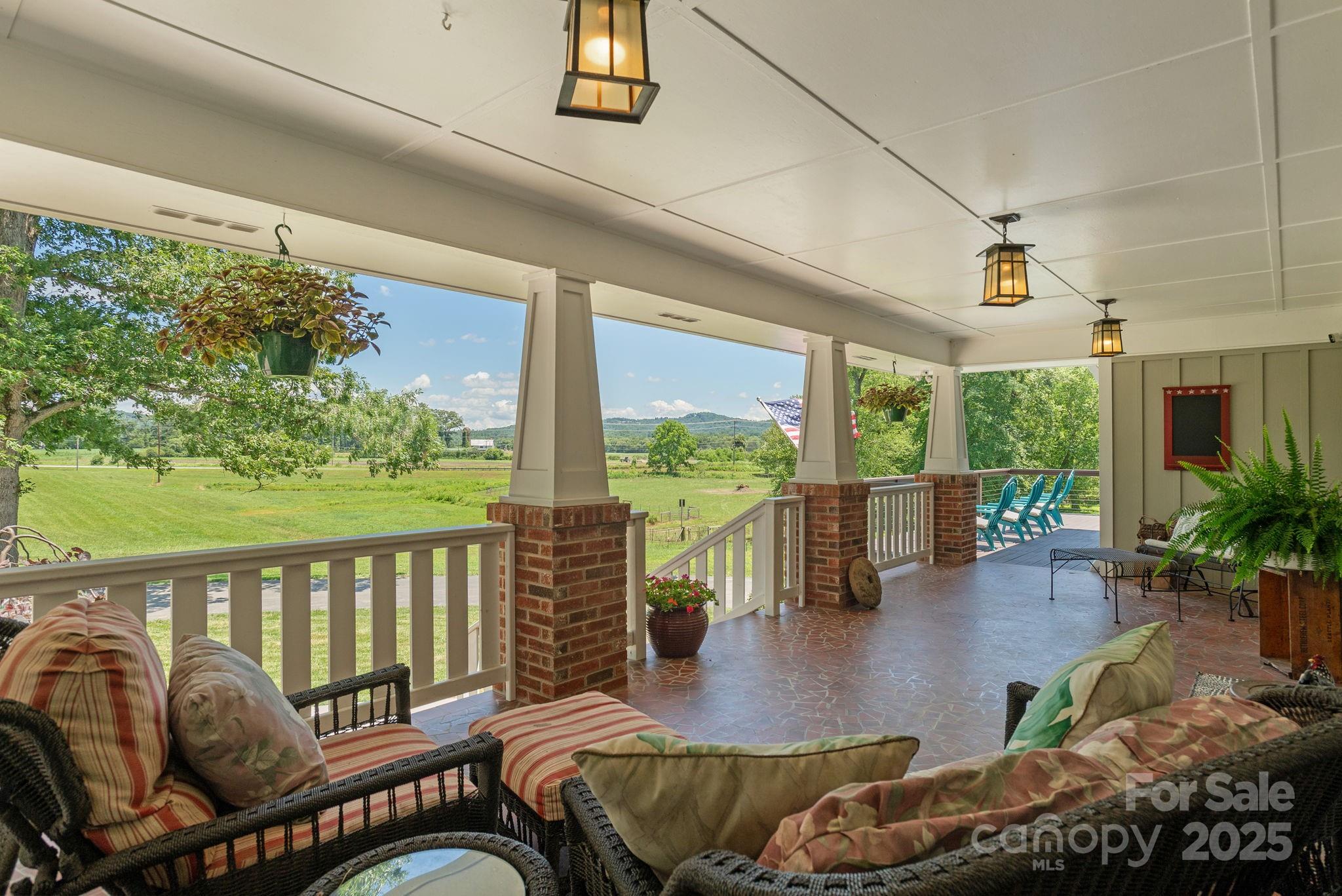 16 School House Road Mills River, NC 28759 - Photo 6 of 48 a balcony with furniture and garden view