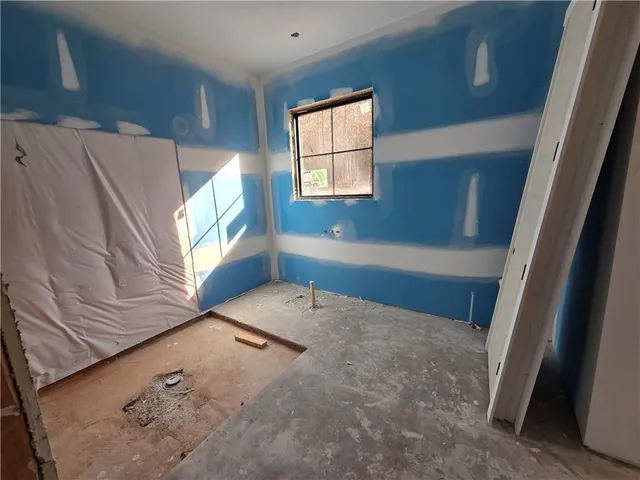 a view of a window in an empty room