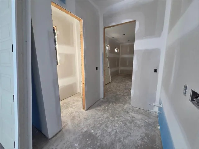 a view of a bathroom with a glass door and shower