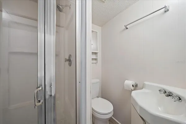 a view of hallway with wooden floor