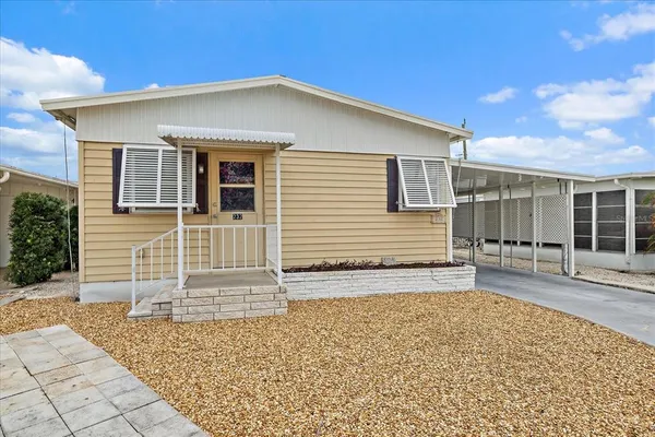 a view of a house with a patio