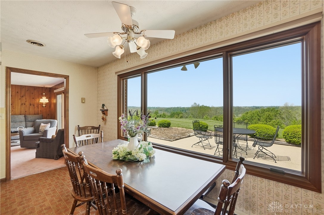 5669 O Neall Road Waynesville, OH 45068 - Photo 27 of 72 Enjoy scenic outdoor views and ample dining space in this inviting room.
