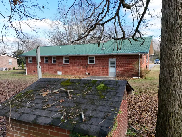 an outdoor sitting area with golf course