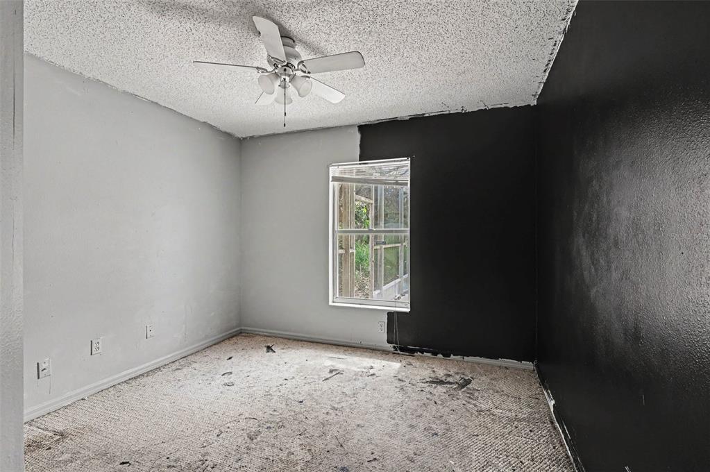 4716 Spaniel Street Orlando, FL 32818 - Photo 21 of 27 a view of a window in an empty room