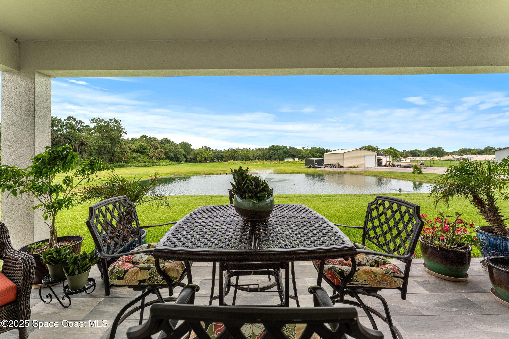 6435 Dixie Way Mims, FL 32754 - Photo 35 of 56 rear porch