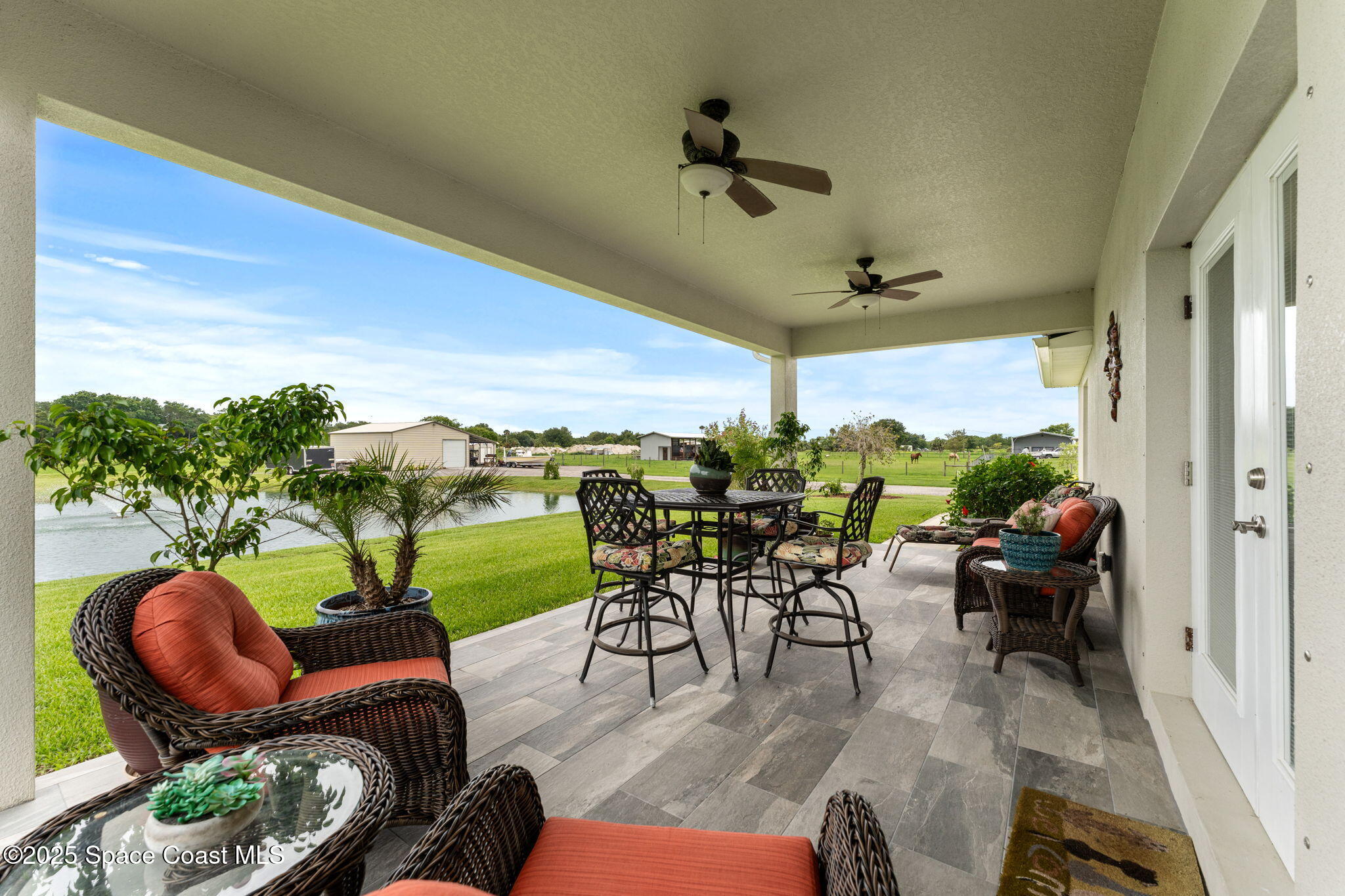 6435 Dixie Way Mims, FL 32754 - Photo 36 of 56 rear porch