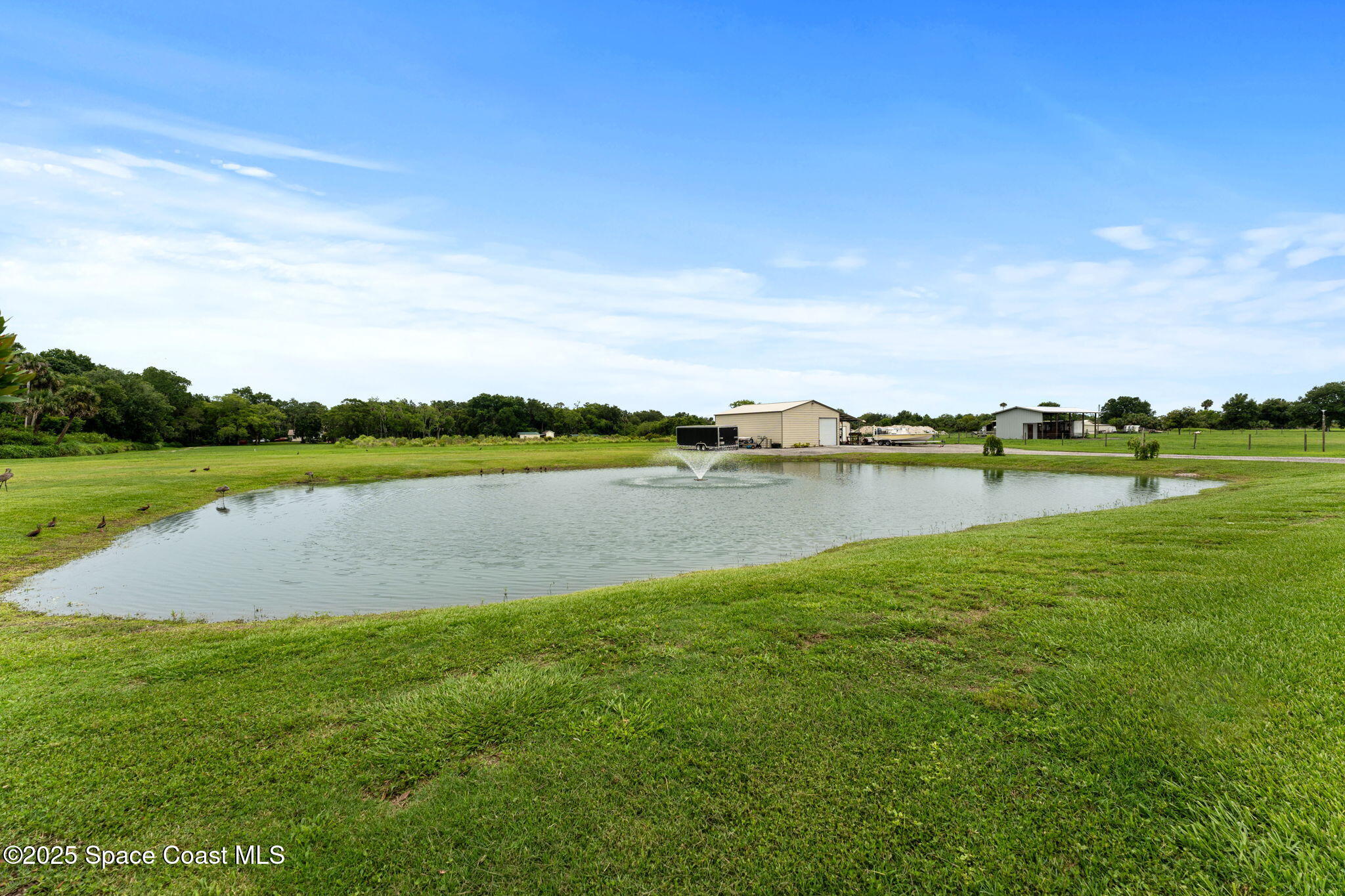 6435 Dixie Way Mims, FL 32754 - Photo 38 of 56 backyard pond