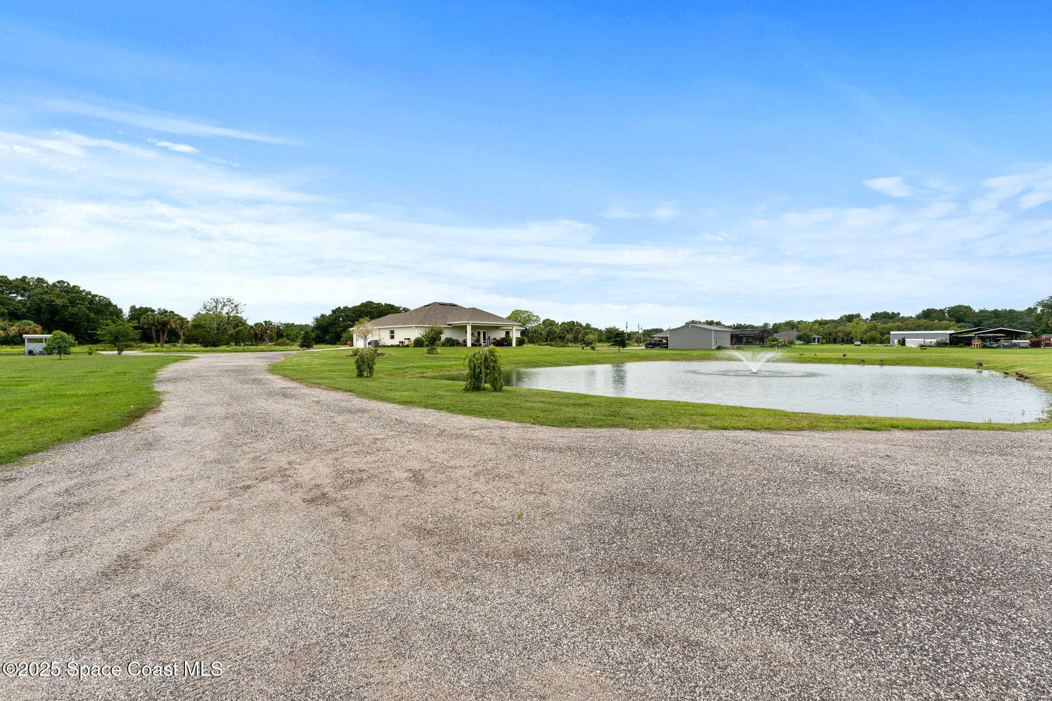 6435 Dixie Way Mims, FL 32754 - Photo 45 of 56 backyard facing home