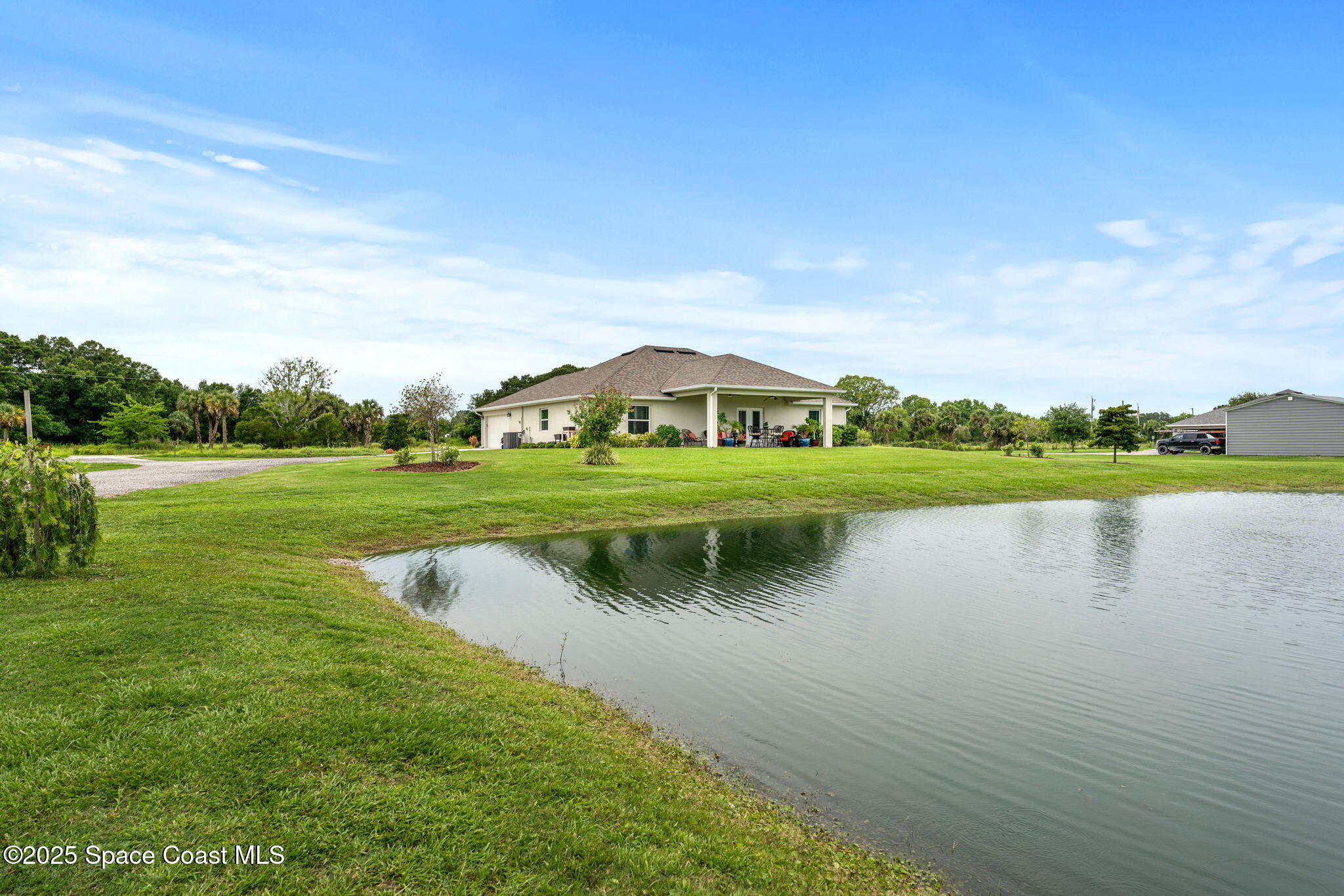 6435 Dixie Way Mims, FL 32754 - Photo 46 of 56 backyard facing home