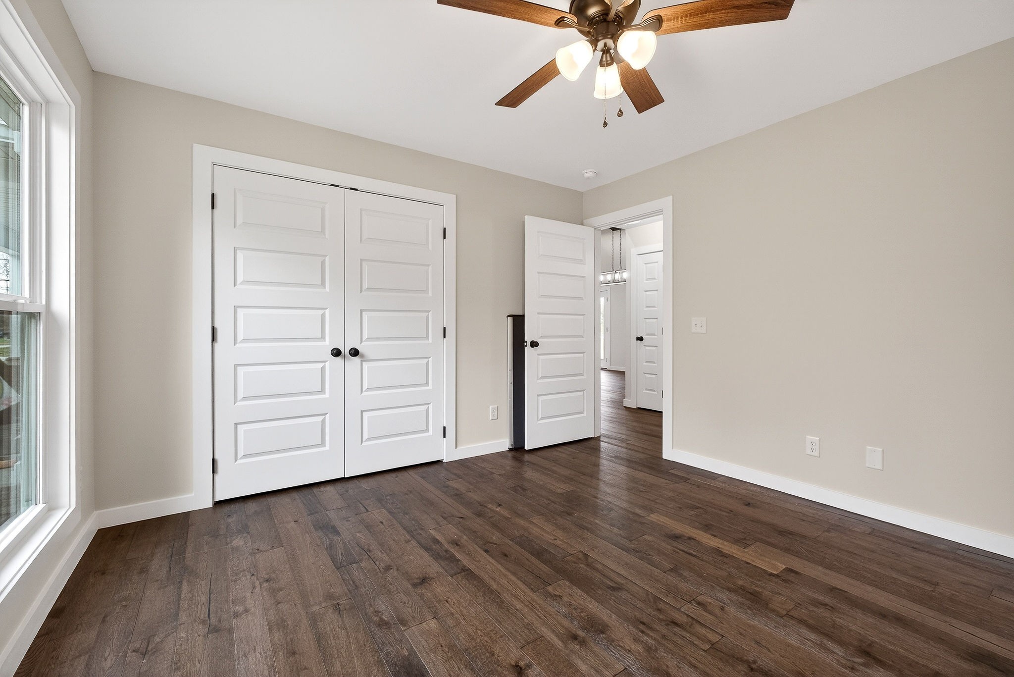 4140 Eller Ridge Road Cookeville, TN 38506 - Photo 17 of 33 wooden floor in an empty room with a window