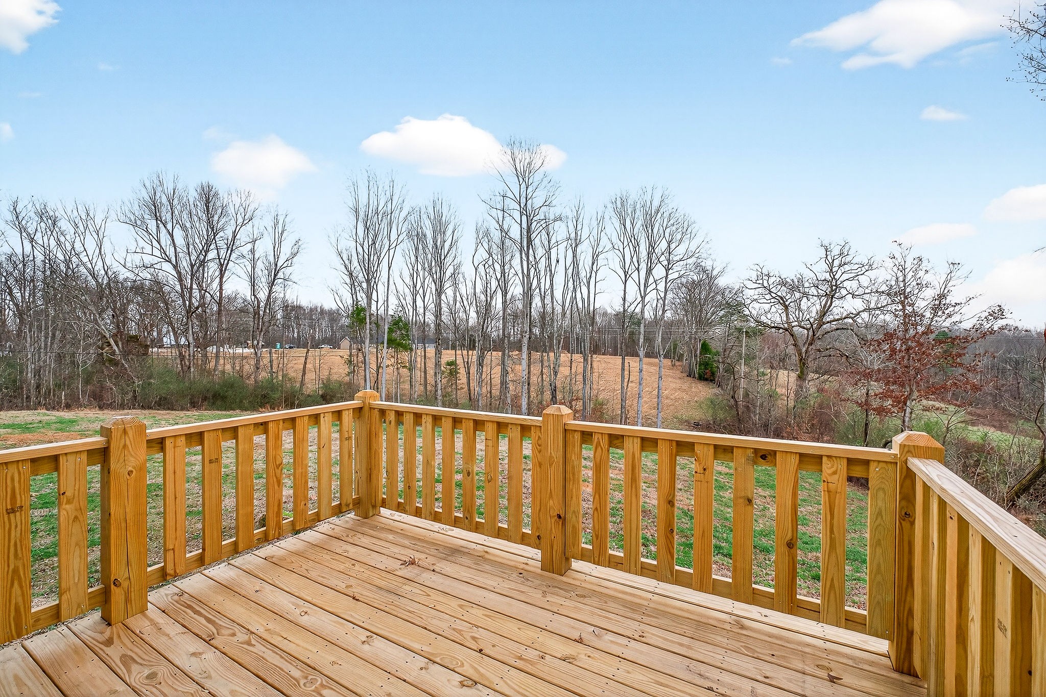 4140 Eller Ridge Road Cookeville, TN 38506 - Photo 30 of 33 a view of wooden balcony and trees