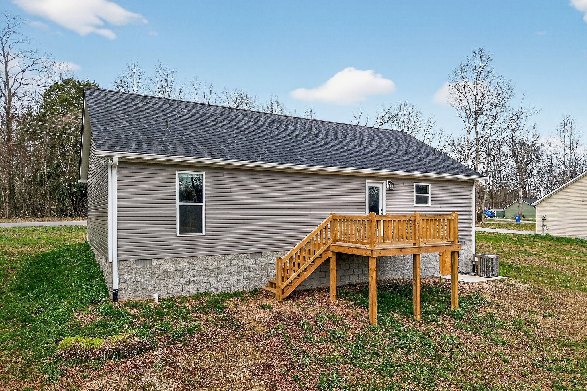 4140 Eller Ridge Road Cookeville, TN 38506 - Photo 31 of 33 a backyard of a house with table and chairs