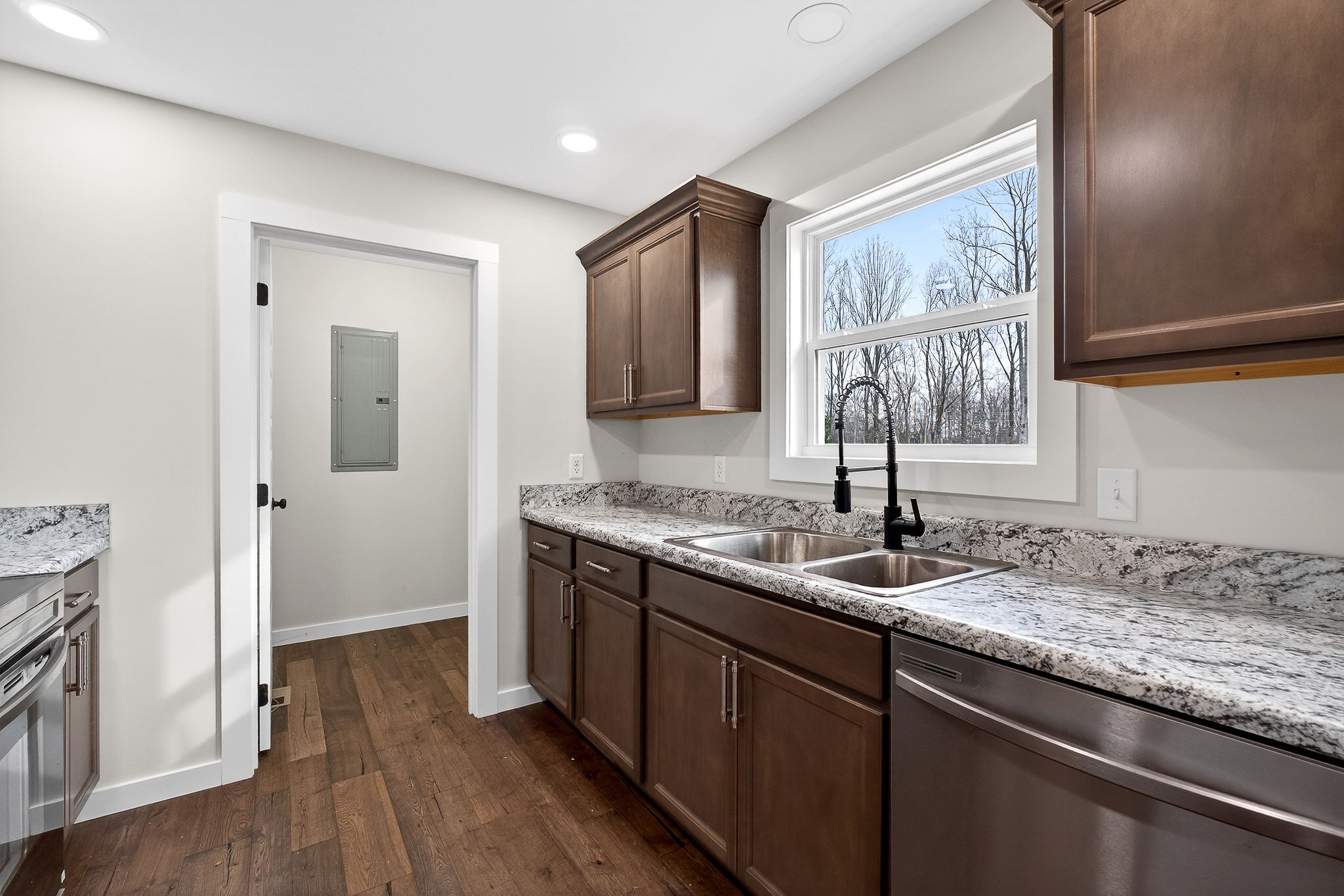 4140 Eller Ridge Road Cookeville, TN 38506 - Photo 8 of 33 a kitchen with a sink stove and refrigerator