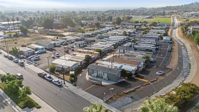 a terrace with outdoor seating and city view