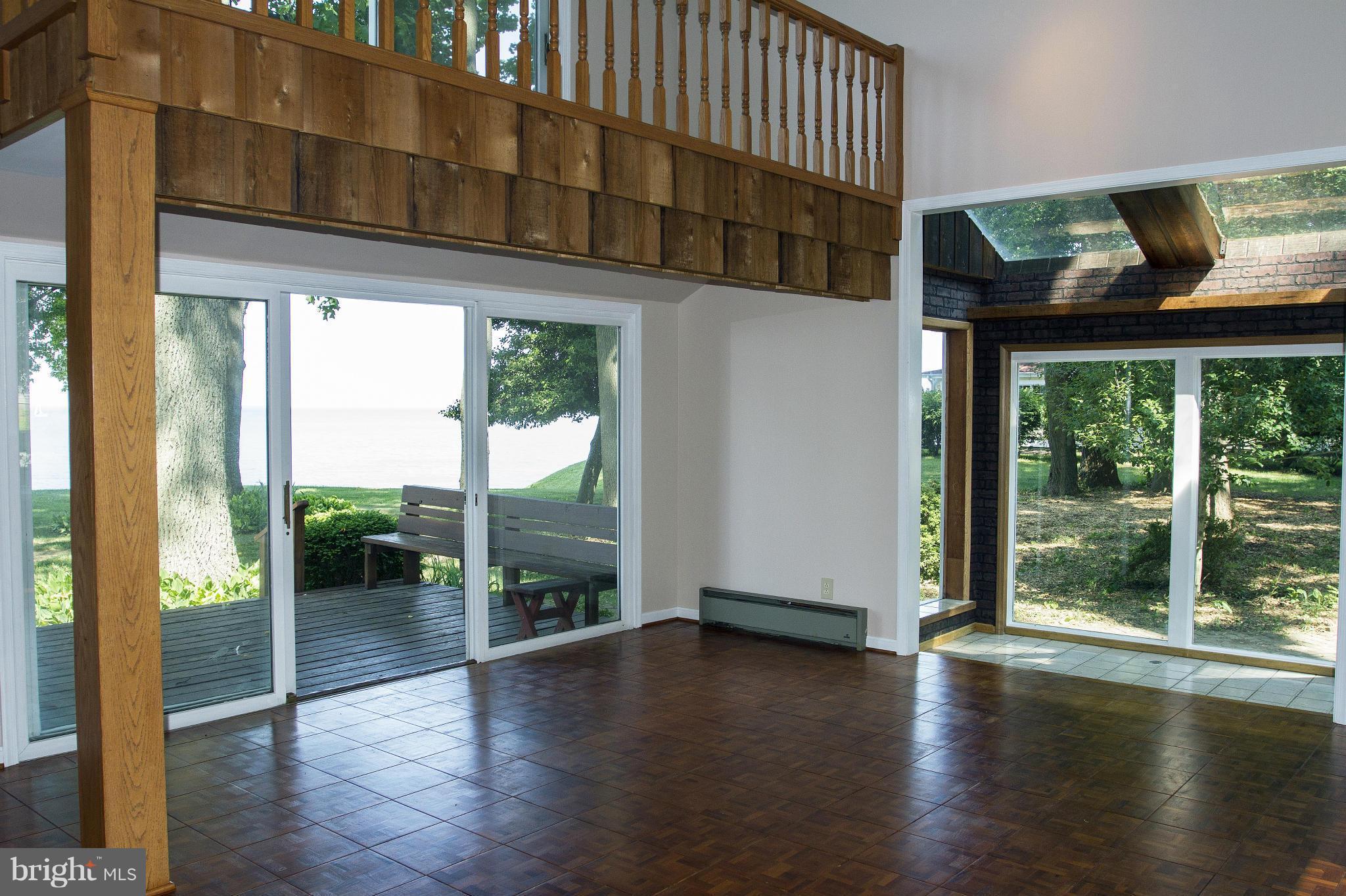 2001 Chesapeake Road Annapolis, MD 21409 - Photo 16 of 30 dramatic master bdr w/ side glassed sitting rm