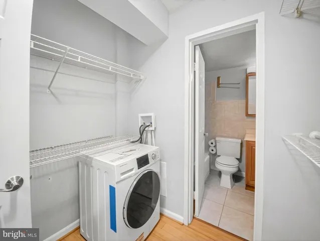 a view of a bathroom with a washer and dryer