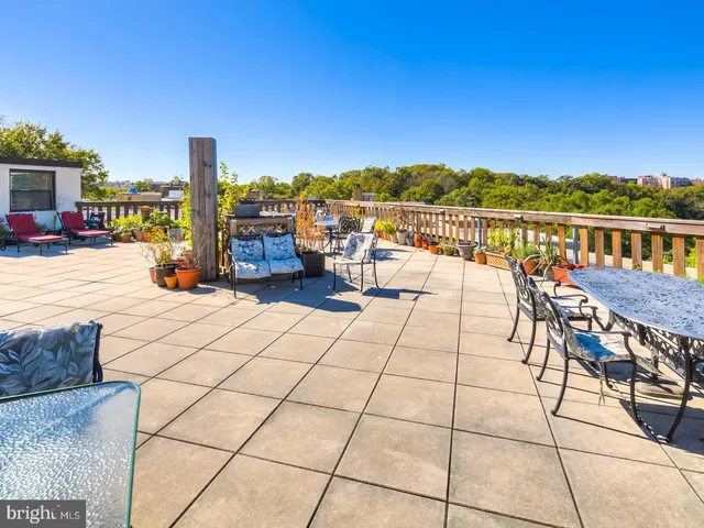 a view of a backyard with a patio