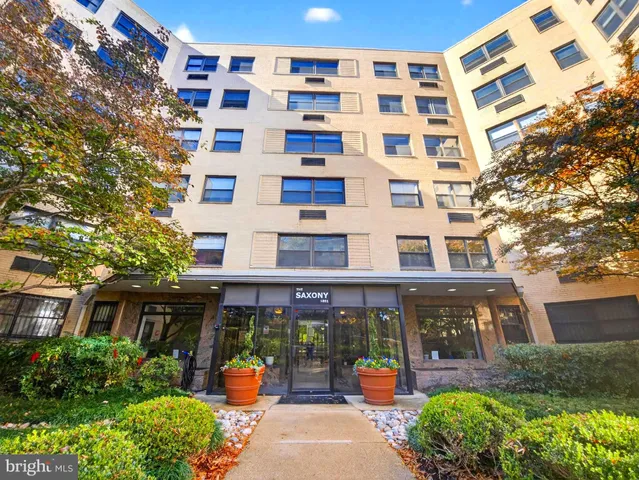 a view of a cars parked in front of a building
