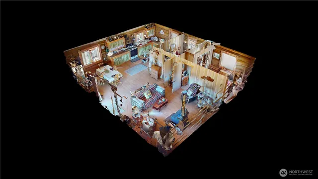 a bedroom with furniture and a wooden floor