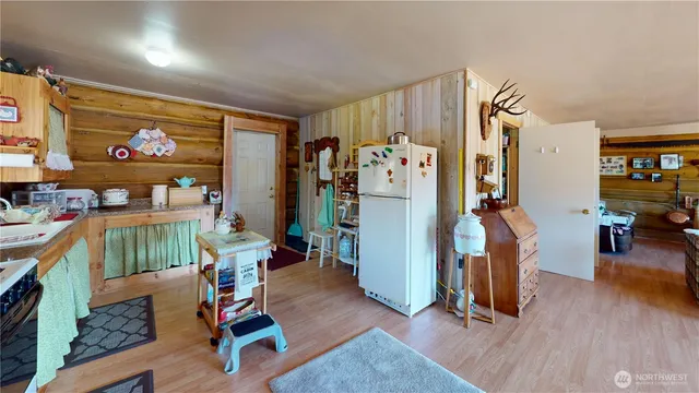 a view of a yard with a tree