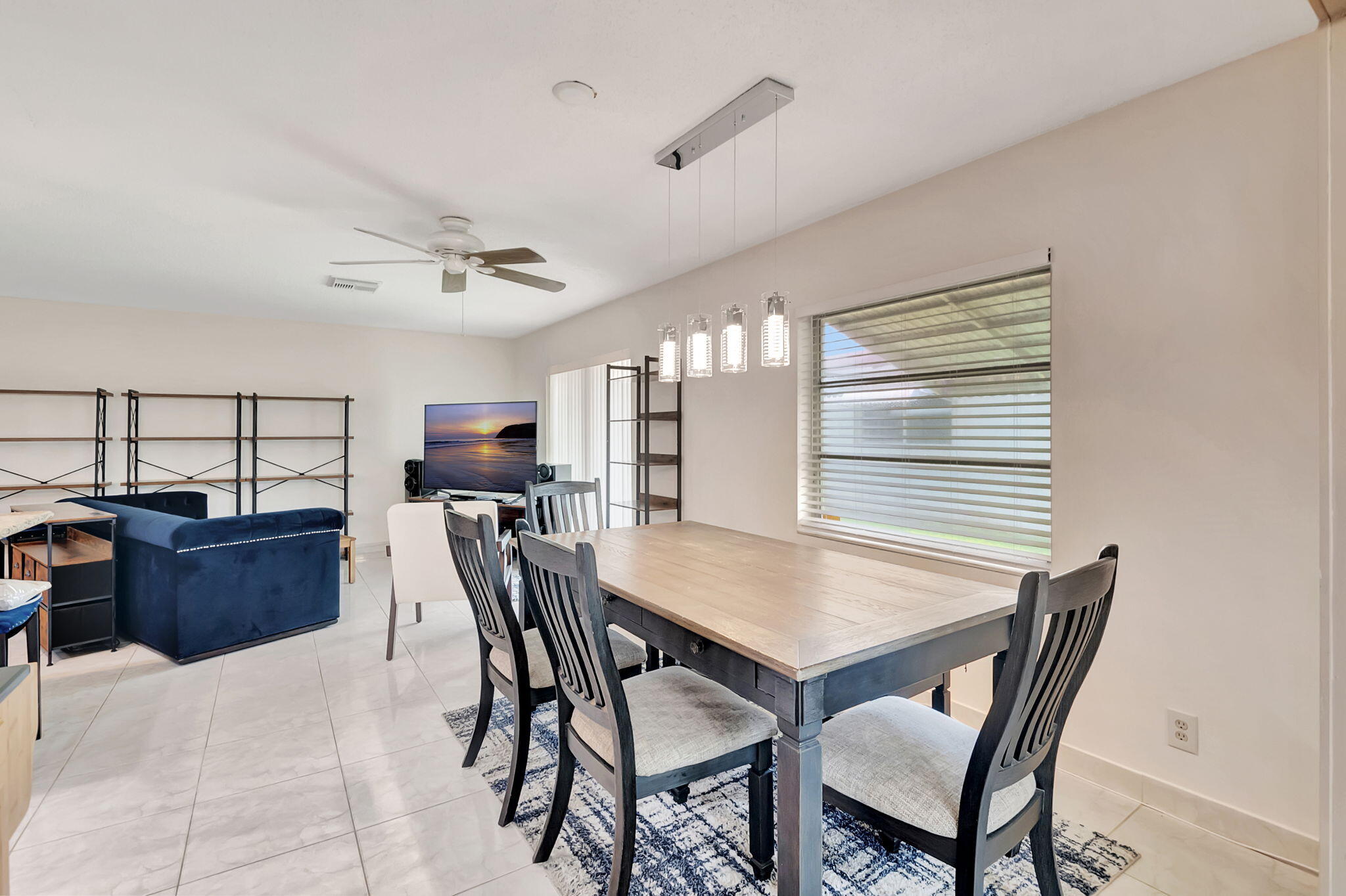 6078 Dusenburg Road Delray Beach, FL 33484 - Photo 15 of 78 a view of a dining room with furniture