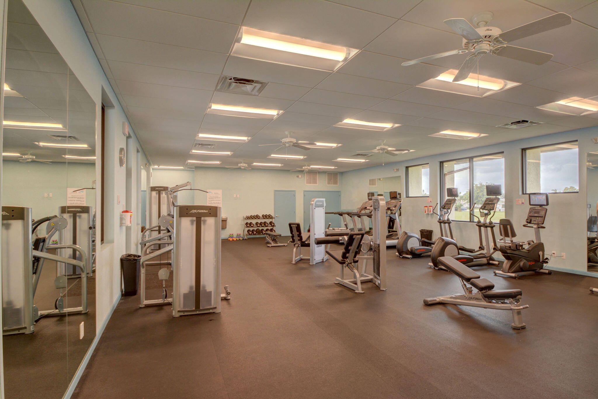 6078 Dusenburg Road Delray Beach, FL 33484 - Photo 49 of 78 a view of a room with gym equipment