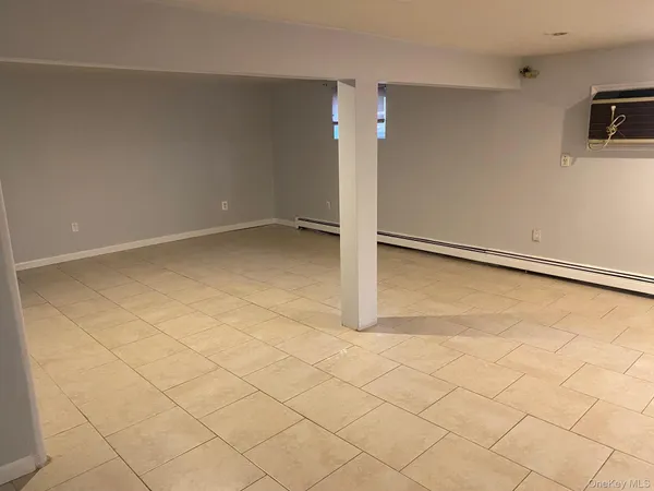 an empty room with a bathroom
