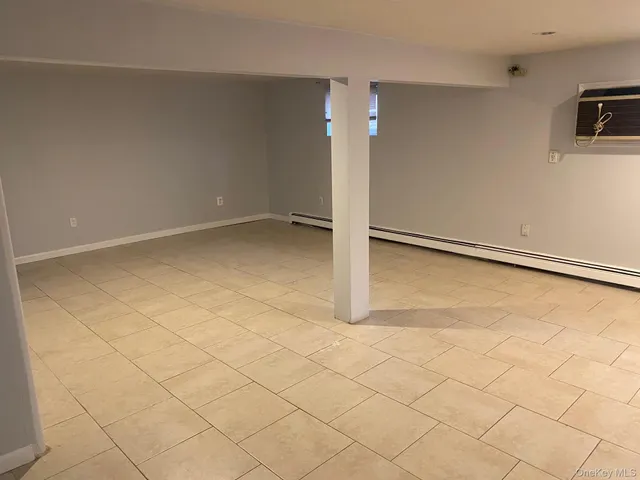 an empty room with a bathroom