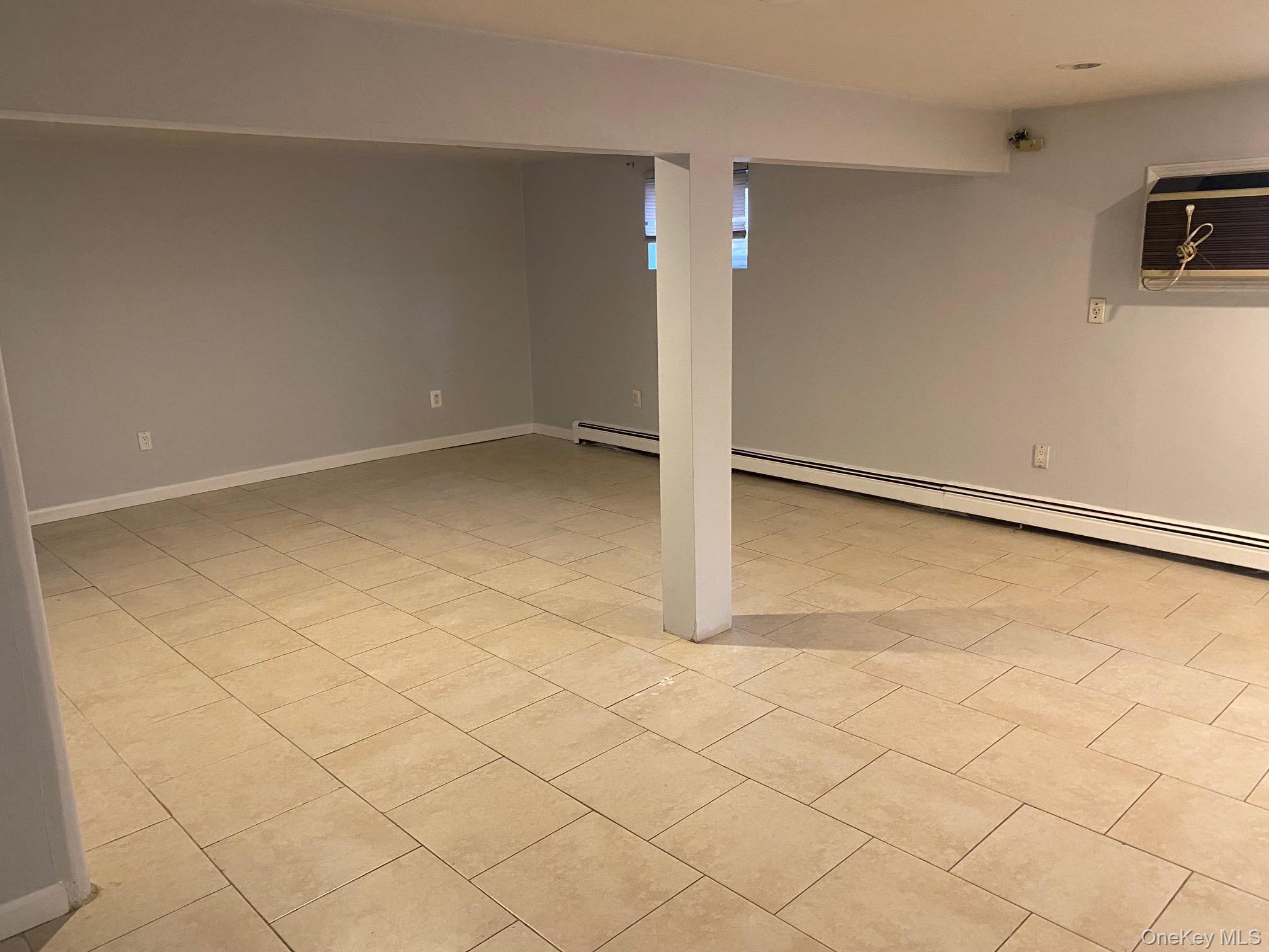 723 Hungry Harbor Road Valley Stream, NY 11581 - Photo 16 of 19 a view of an empty room
