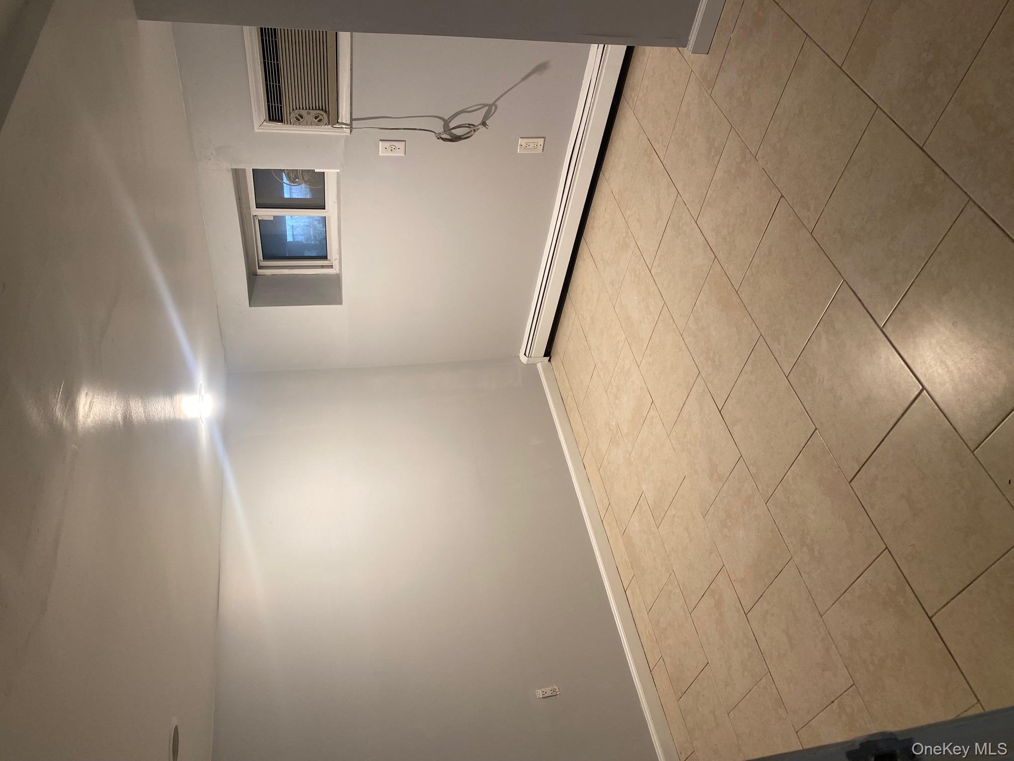 723 Hungry Harbor Road Valley Stream, NY 11581 - Photo 18 of 19 an empty room with a bathroom