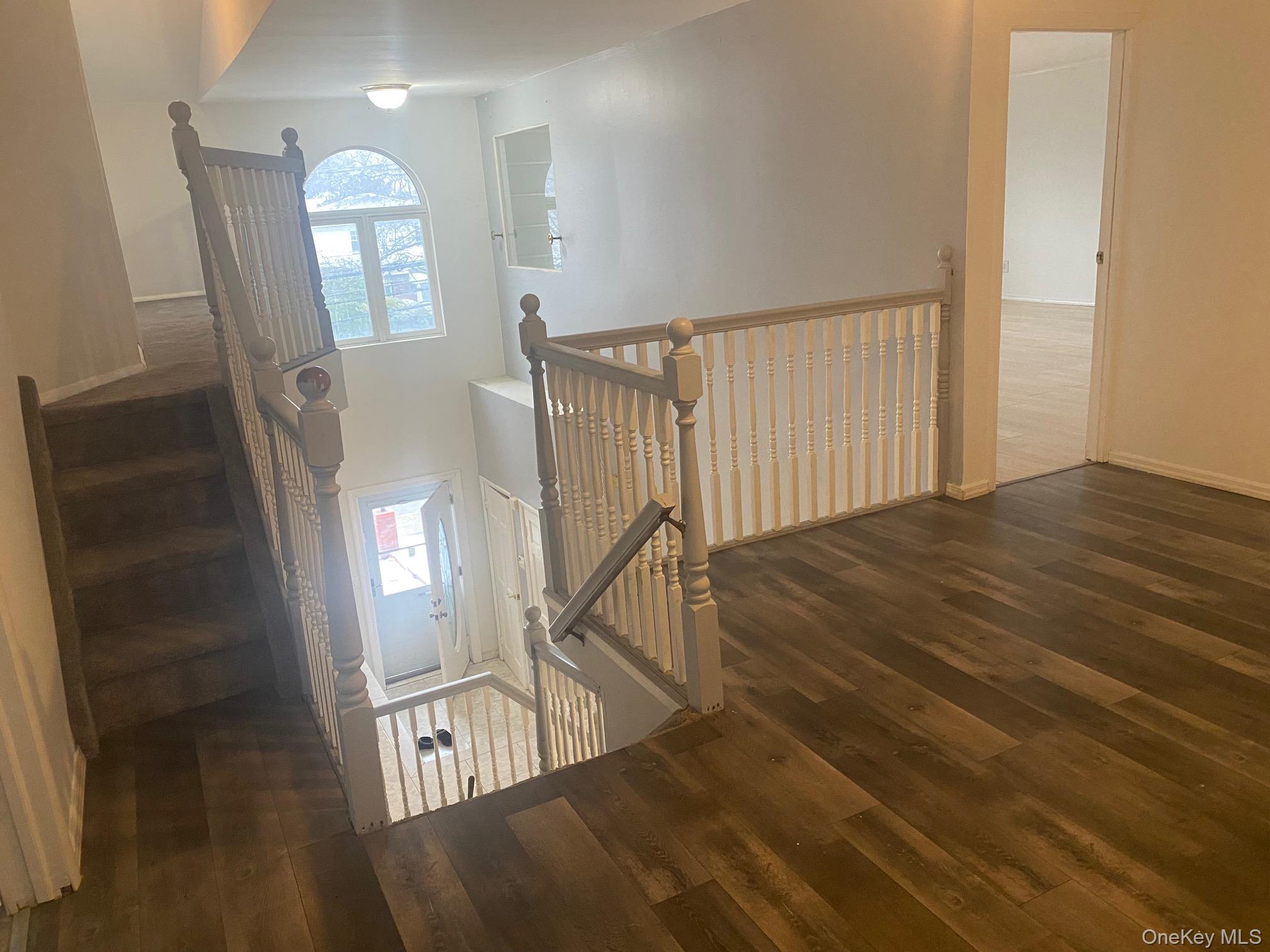 723 Hungry Harbor Road Valley Stream, NY 11581 - Photo 7 of 19 a view of an entryway with wooden floor