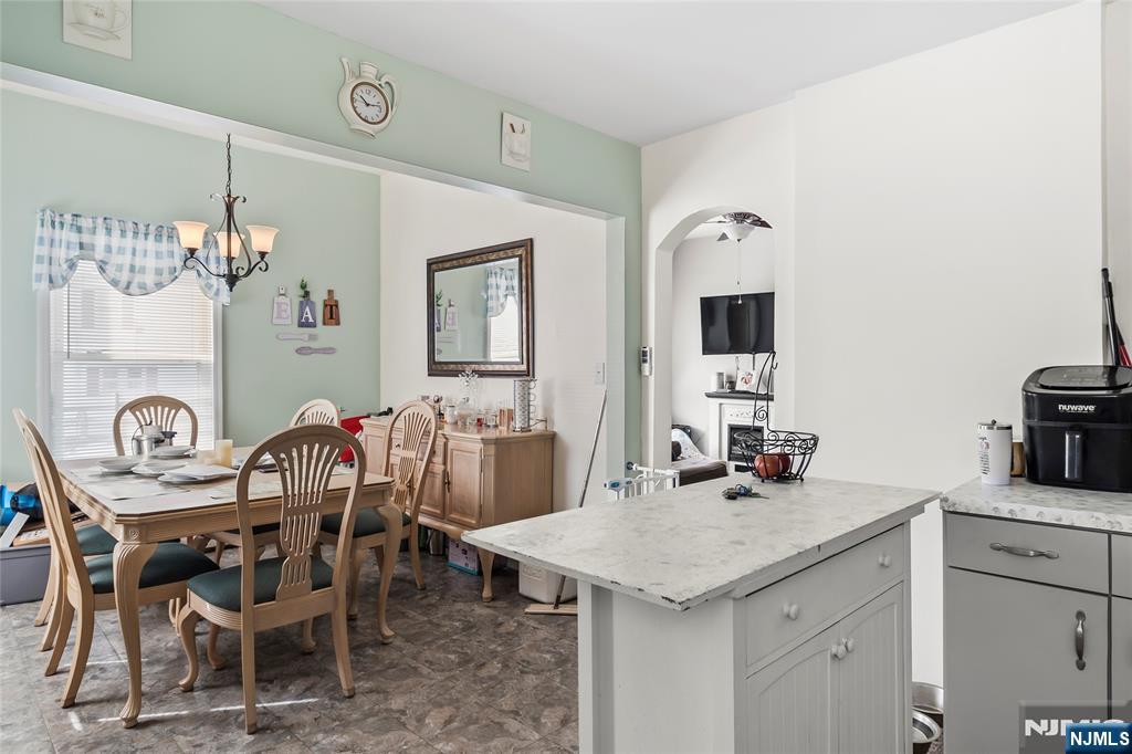 262 Union Avenue Paterson, NJ 07502 - Photo 5 of 17 a view of a dining room with furniture and chandelier