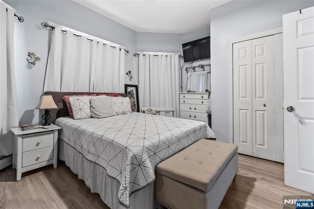 262 Union Avenue Paterson, NJ 07502 - Photo 7 of 17 a bedroom with a bed and a window