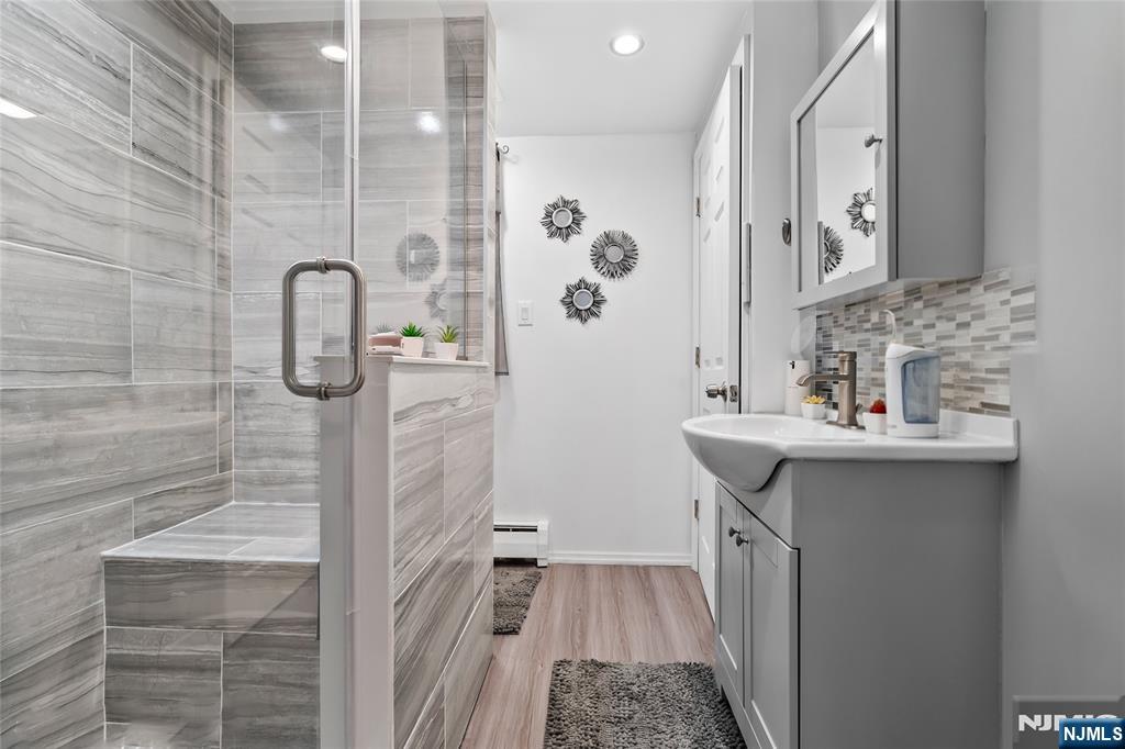 262 Union Avenue Paterson, NJ 07502 - Photo 9 of 17 a bathroom with a sink a toilet and shower