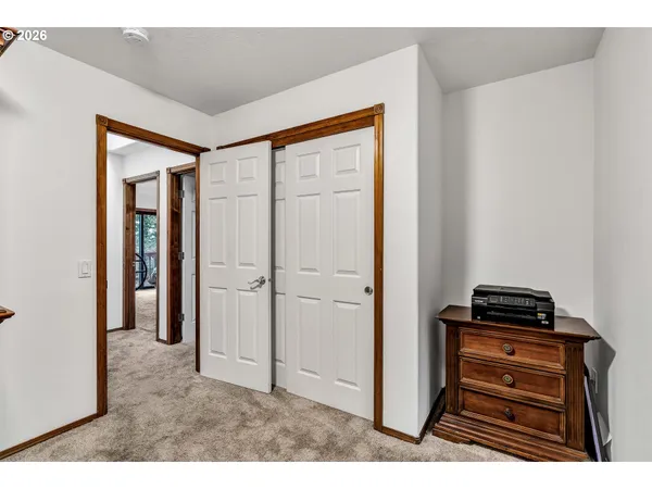 a view of a kitchen from the hallway